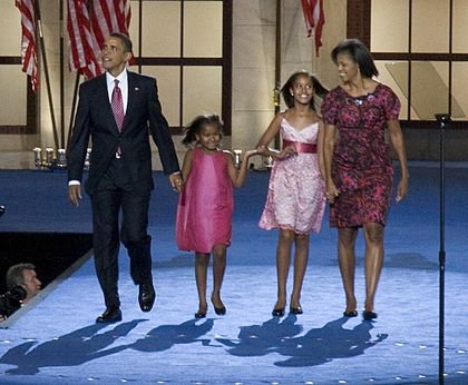 Verified real photograph: Barack Obama, Michelle Obama and their daughters walking on stage on the final night of the 2008 Democratic National Convention.